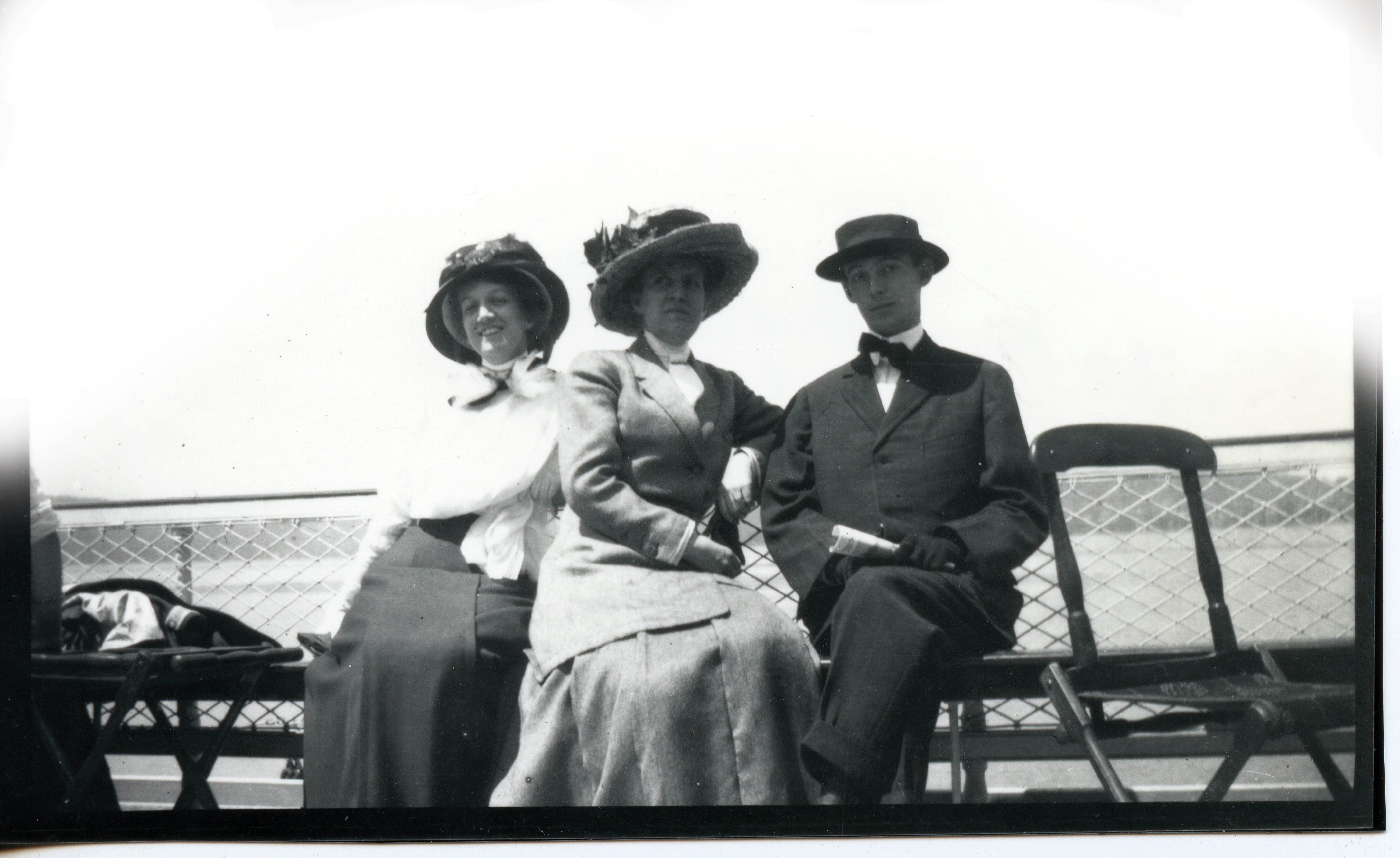 Beach Bound: Charleston author, poet, and playwright DuBose Heyward (right) on the Folly Beach ferry, circa 1920.