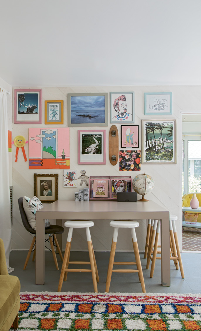 Rather than replace the existing flooring, she painted it grey and added a brightly patterned piece from Rugs USA.