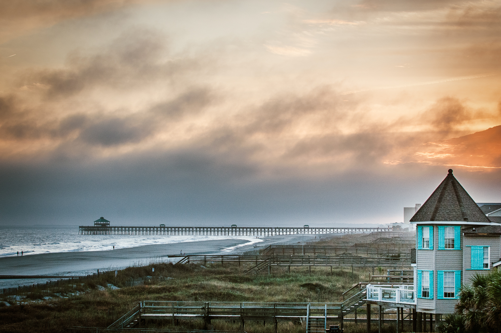 HONORABLE MENTION Professional category: Folly Fog by Pamela Oliveras “I drove down to Folly in January to capture the sunset and right as I got there a fog started rolling in. But it made the shot for me with the bit of the sunset orange pushing through and the blue of the beach house—gorgeous!”