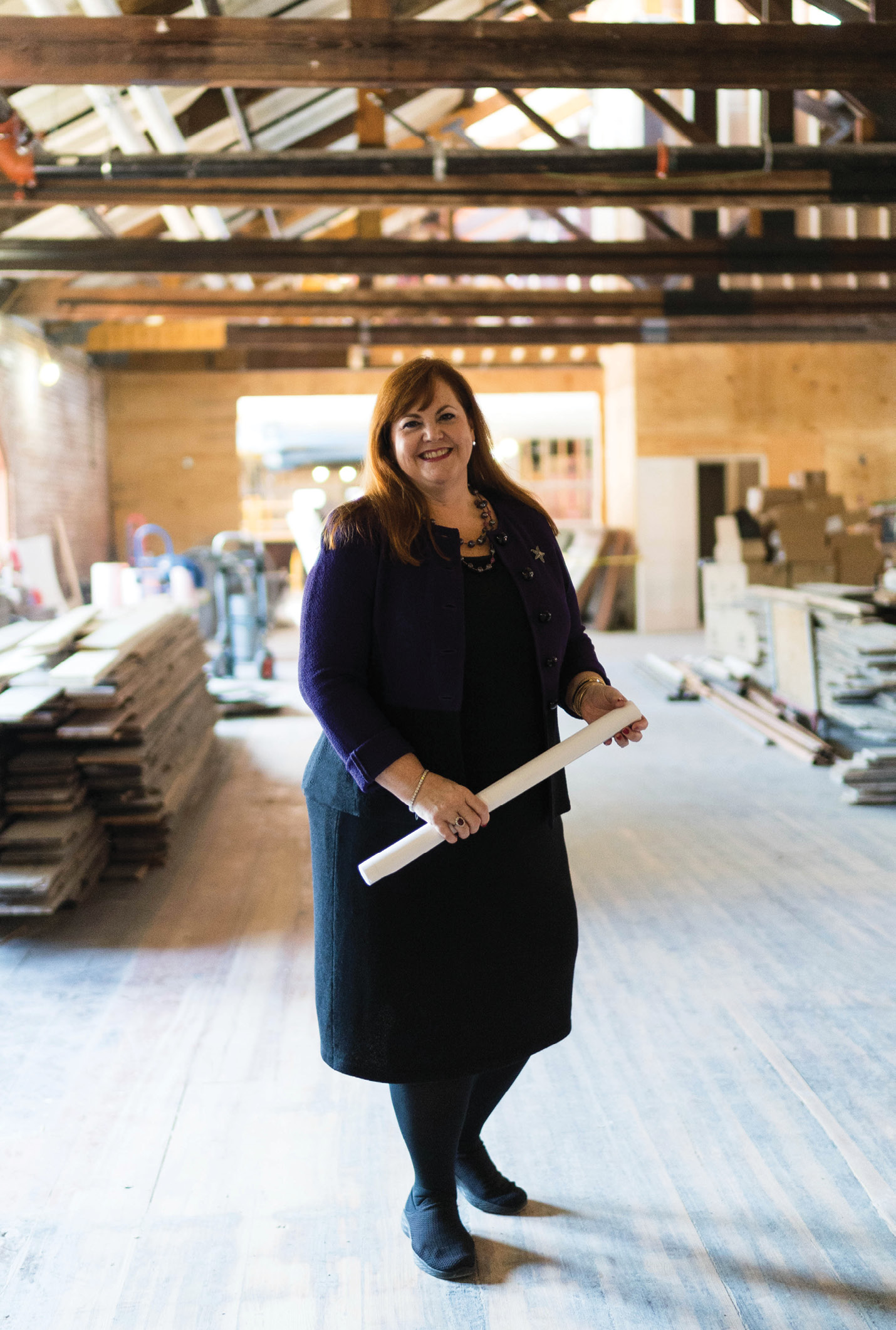 Explore Charleston CEO Helen Hill at the Charleston Visitor Center, which is being redesigned to include interactive elements, such as a demo kitchen, that are inviting for visitors and locals alike, as well as messaging to help “visitors understand that Charleston is a working city,” she says