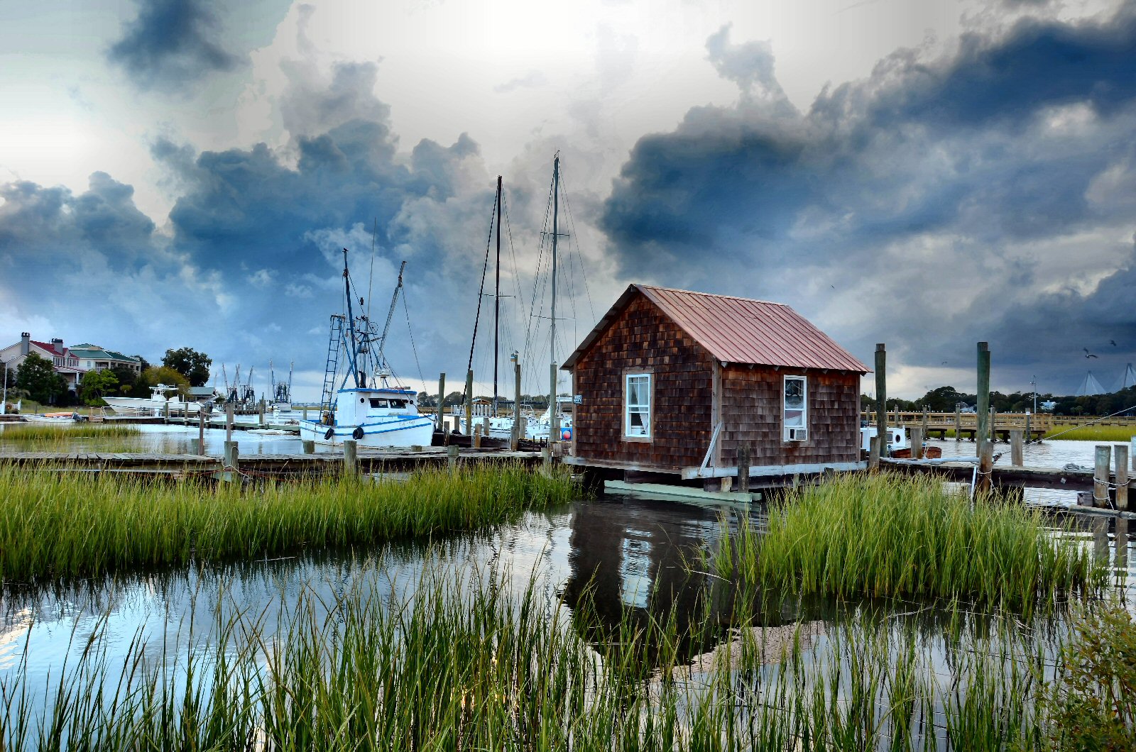 WINNER! Amateur category: Before the Storm by Pamela Talbird; “I was driving through Mt. Pleasant when a storm was moving in.  The sky was changing drastically so I stopped off at Shem Creek to shoot a few photos before the downpour.”