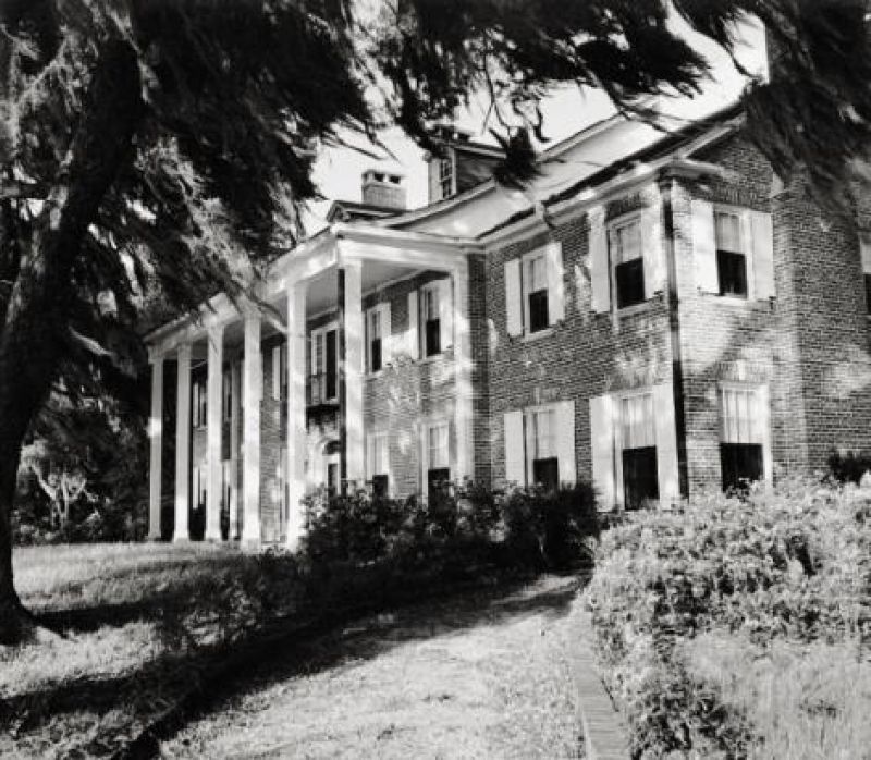 The family’s stately brick Hobcaw House—which Bernard had rebuilt in 1929 after a fire destroyed the original wood home—on a bluff overlooking Winyah Bay