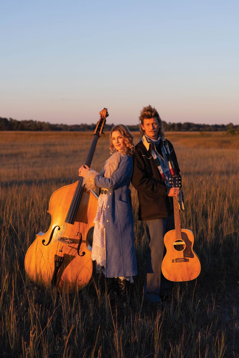 Sunset Serenade: Grammy-winning bassist Shelby Means and singer-songwriter Joel Timmons in the marsh near their home on Folly Beach.