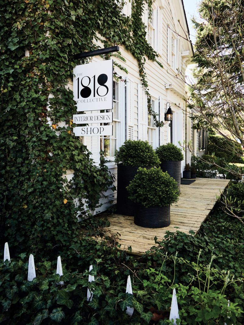 The vines and gates at the entrance to 1818 Collective, a design shop inside a historic home in Sag Harbor.