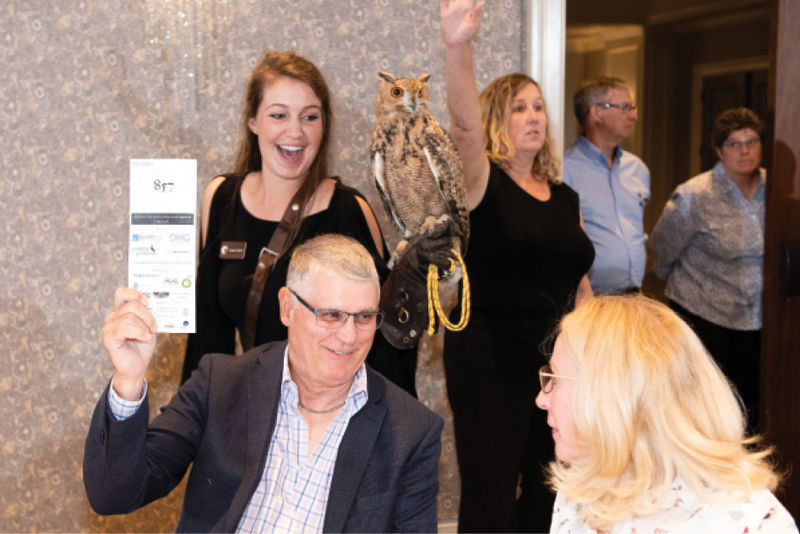 Charles Singleton and Deborah Rickman with educator Jessie Curry and a Savigny’s eagle owl