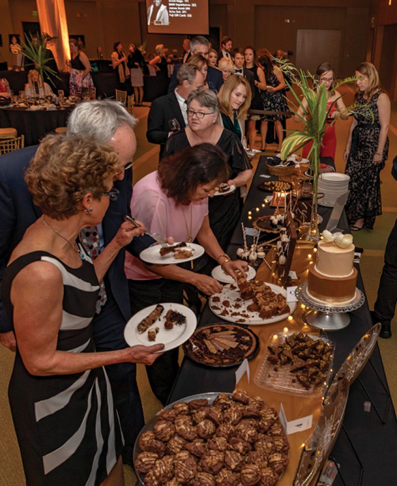 Attendees lined up to try treats from more than 15 local bakeries and restaurants.