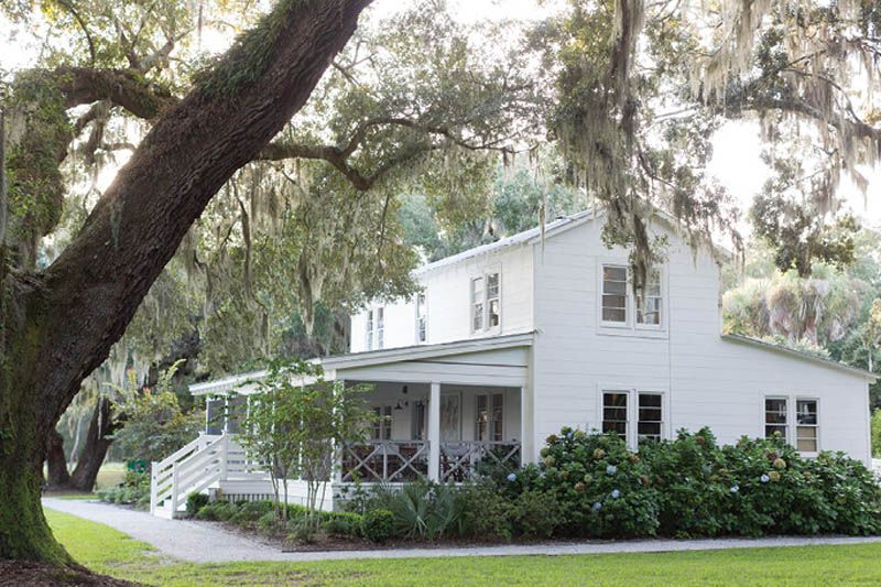 An existing farmhouse now serves as the Welcome Center and community event space.