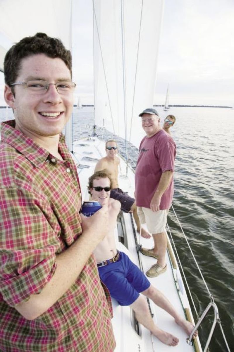 Cheering Section: Guests aboard Fate get an up-close, but laid-back view of a Wednesday evening race.