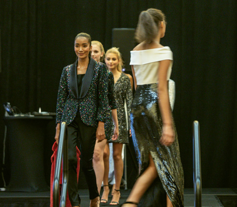 Angelina Anderson, Nara King, Cora Bisbee, and Shelby Ludema walking the runway