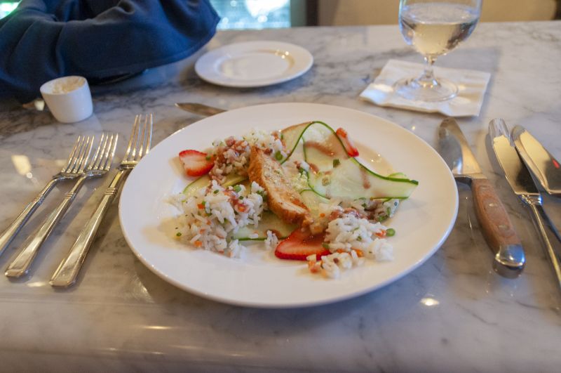 Spicy barbecue chicken with cucumber, jasmine rice, and a strawberry vinaigrette, prepared by Little Chef Ella Bruno and Big Chef Marc Collins of Circa 1886.