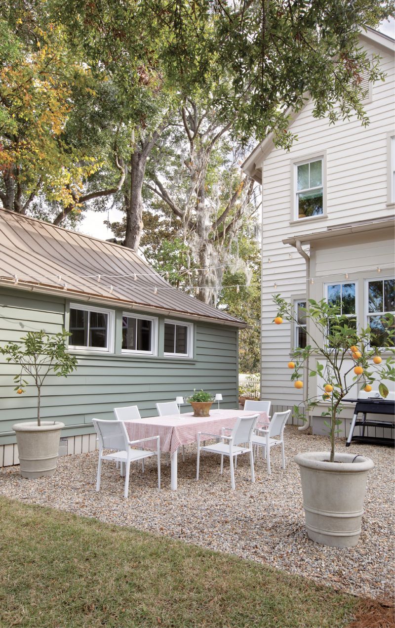 The garden also serves as an outdoor dining room where the family can convene around the Couture Jardin table from Outside Is In, while enjoying the scent of fresh citrus from their trees.