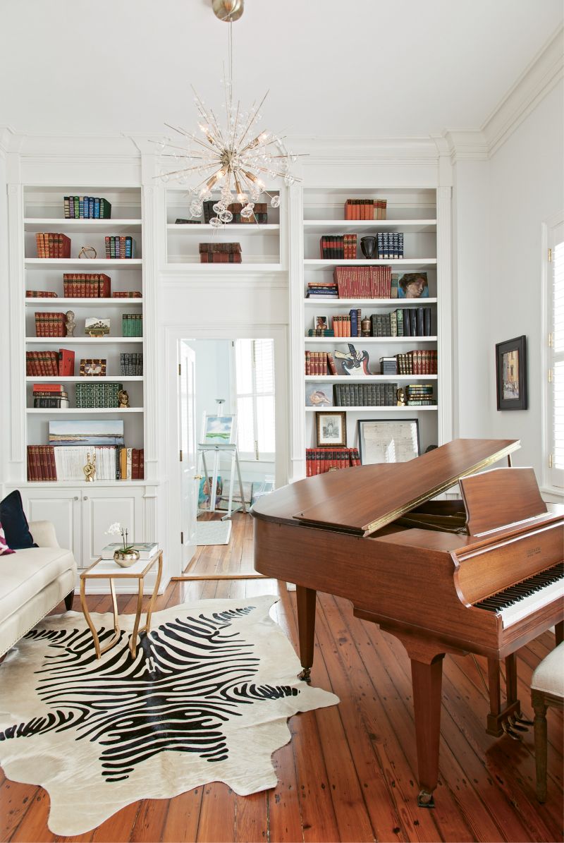 “Madelyn and Avery love to make up songs on the piano. They will put on little shows and ask us to sit on the sofa in here to watch,” says Shannon of the music room, which is used primarily for the girls’ weekly voice and piano lessons.