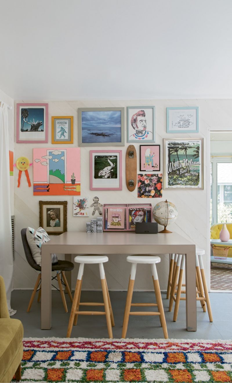 Rather than replace the existing flooring, she painted it grey and added a brightly patterned piece from Rugs USA.