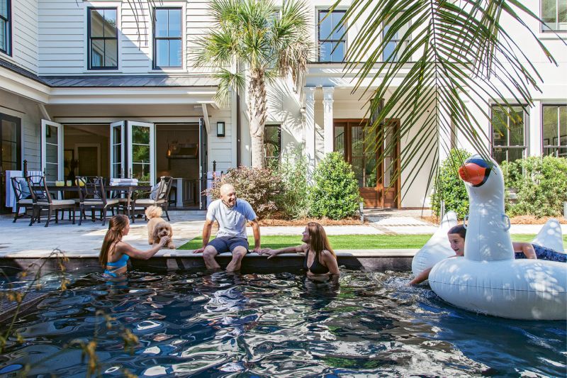 Center Court: A wall of French doors open the kitchen out to the pool and courtyard, where the Cuocos enjoy alfresco meals, thanks to Frank’s culinary prowess