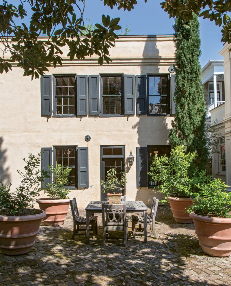 The guest house, built circa 1850, stands perpendicular to the main residence and includes its own kitchen and living space.