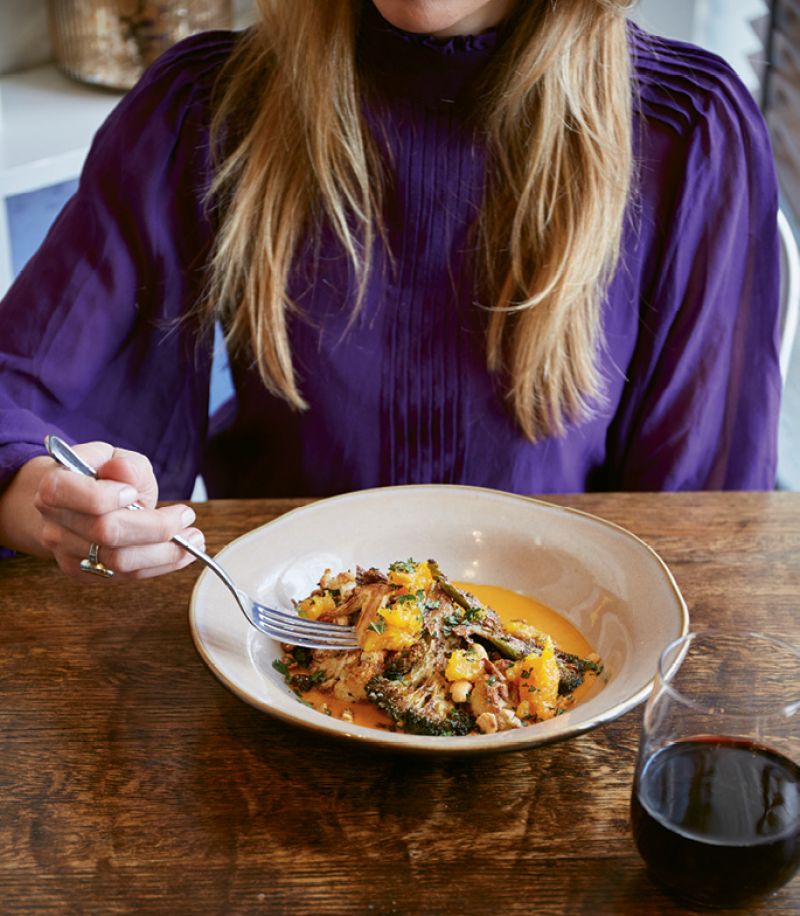 Garden gold: Charred local broccoli and cauliflower are served with herby Romesco sauce and almonds.