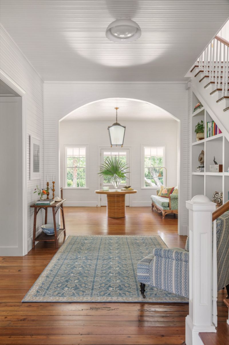 Situated in Sullivan’s Atlanticville Historic District, this Middle Street cottage boasts several classic examples of the island’s architectural vernacular, including a wide center hall.