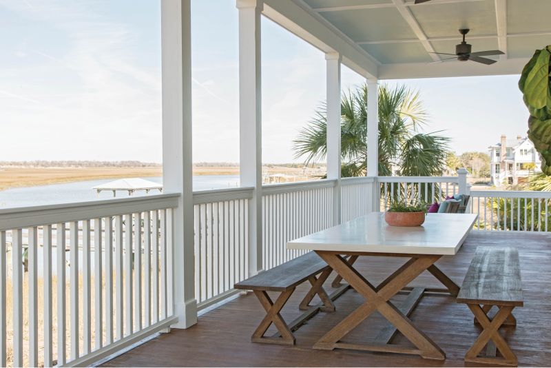 Charleston Table Company crafted the oversized ipe picnic table complete with an immense concrete top that took nine men to heave into place.