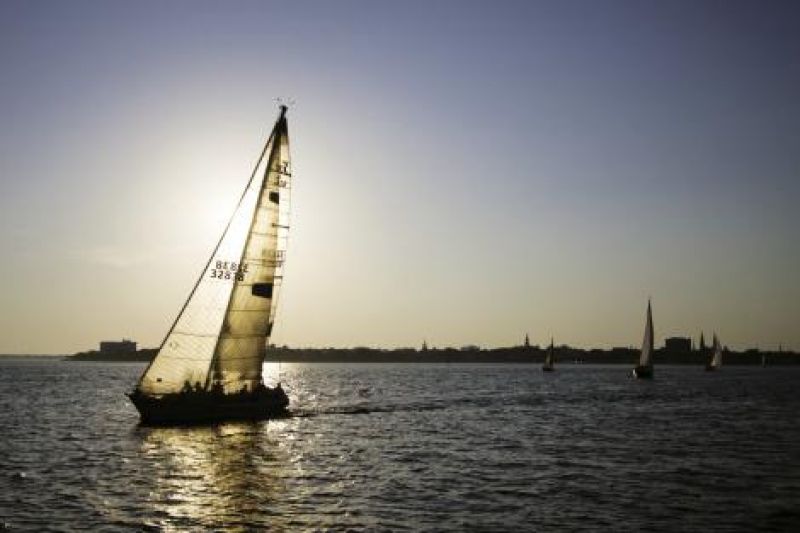 Cruise Control: Captain Kenneth King and his crew make racing look easy as they sail into the sunset aboard Quintette.