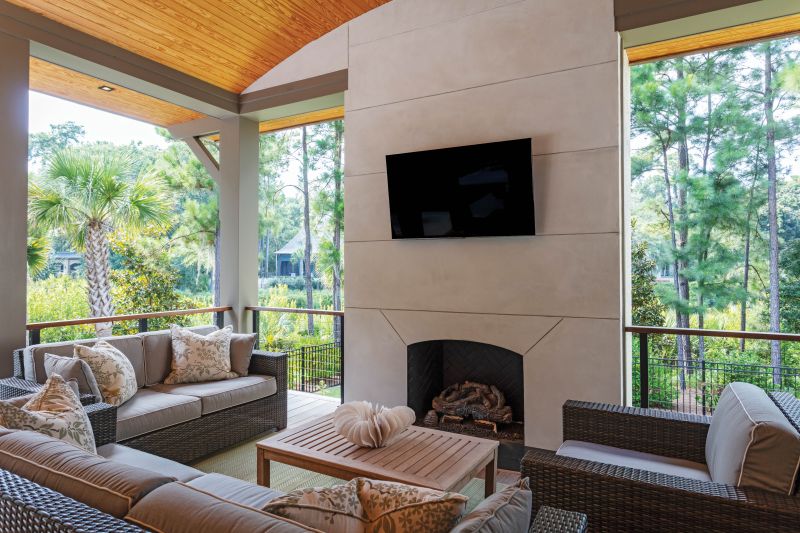The wood theme continues into the outdoor kitchen and living room, which the husband says is his favorite space to relax and watch the Masters or the Super Bowl.