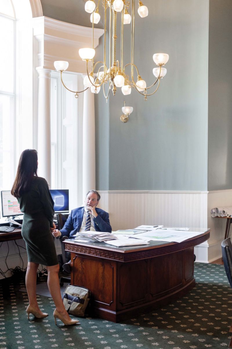 Mayor Cogswell meets with Deja Knight McMillan, the city’s director of communications, in his office in November 2024.