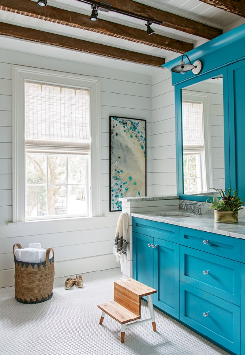 BEAM ME UP: During the renovation, the Rosens discovered old wood ceiling beams in the kids’ bathroom. “We thought they were so wonderful, we left them exposed,” says Melanie.