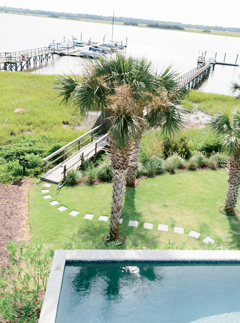 Stone pavers lead from the pool to the family’s dock. “We’re out there a lot; the kids fish and hang out,” Melissa says.