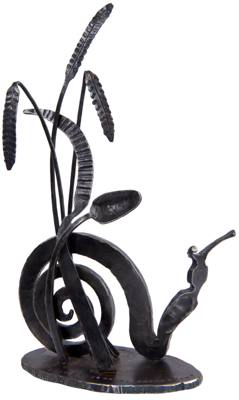 The Snail Award “Legend” honoree receives a locally forged trophy.