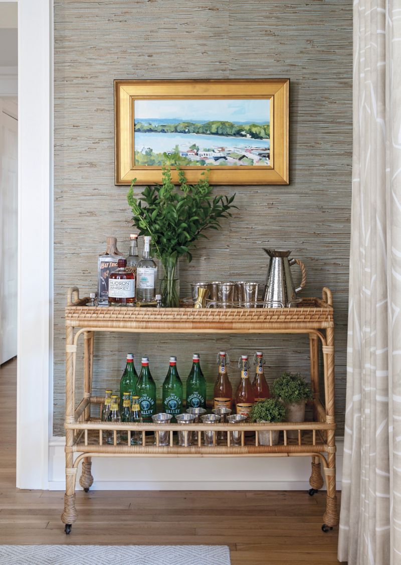 A Serena &amp; Lily bar cart anchors a painting by Michigan artist Richard Kooyman.