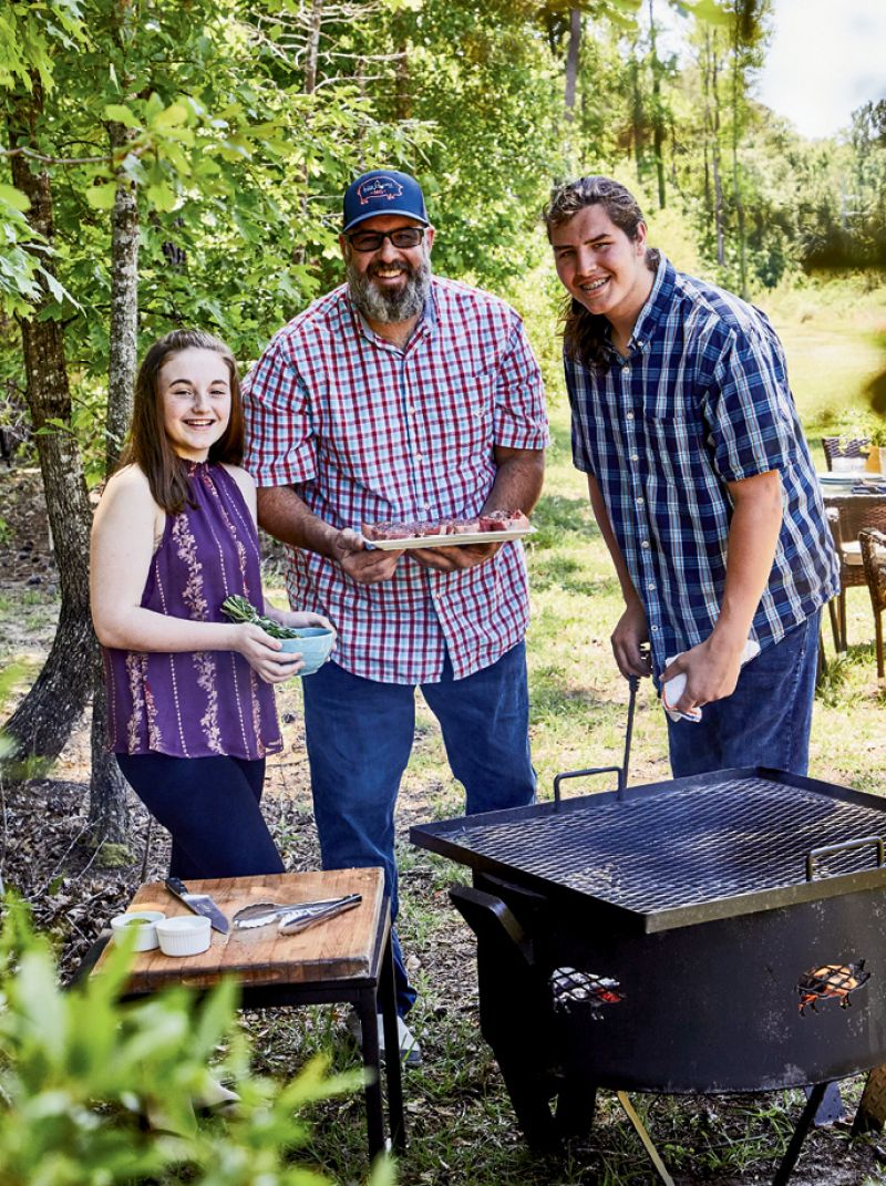 Swig &amp; Swine owner Anthony DiBernardo with his kids, Mia and Asher