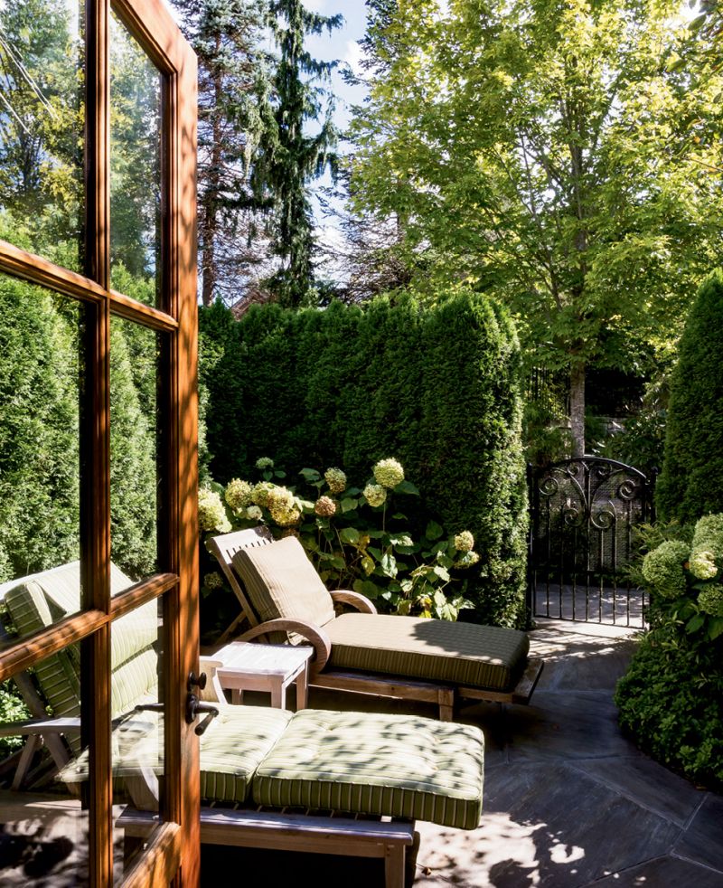 A private sun patio off one of the Hickory Cottage rooms