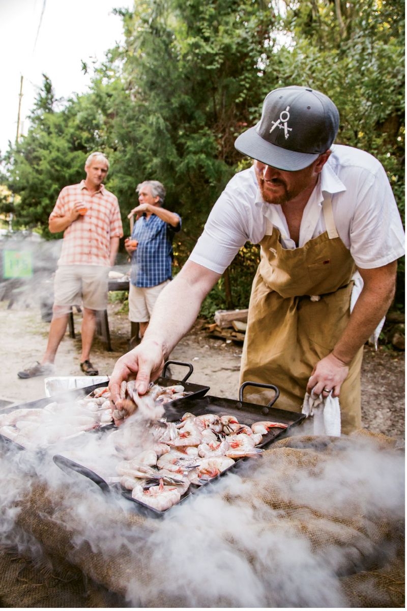 The chef in his element, no stranger to fire.