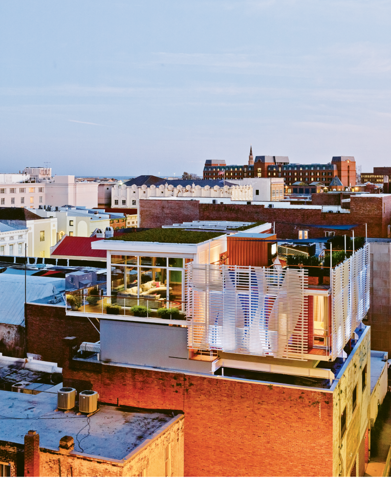 Rich Yessian’s contemporary condo sits atop the antebellum building at 301 King that houses an Apple Store on the first floor. The addition—which boasts a green roof, outdoor living room, and fiberglass louvers that act as a bold design element and a privacy screen—is barely visible from King Street, leaving one of downtown’s most picturesque historic landscapes intact.