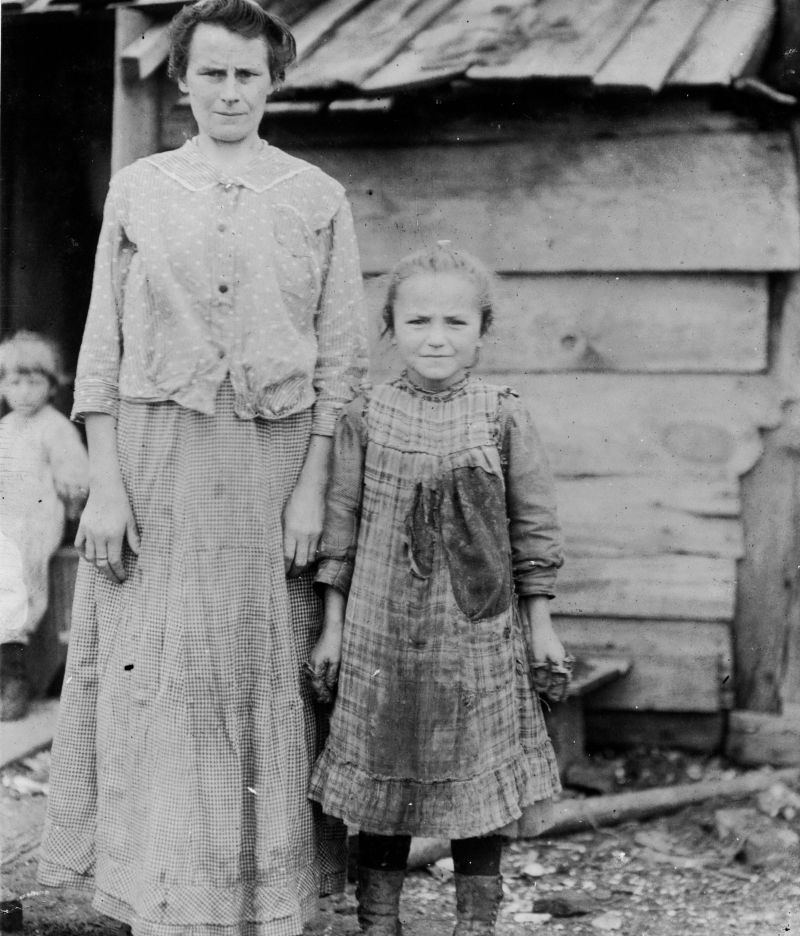 10-year old Sephie, pictured with her mother at the Maggioni Canning Co. in Port Royal in 1912, is said to have shucked six pots of oysters a day.