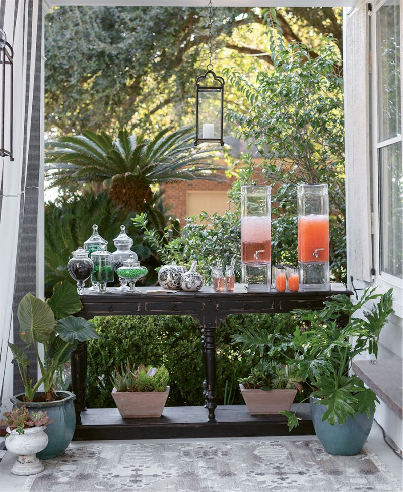 Lisa puts out at least two five-gallon self-serve drink dispensers and fills them with margaritas for adults and a second nonalcoholic option, this year the “Shirley Temple of Doom.” She has refills pre-made to keep each vessel flowing.