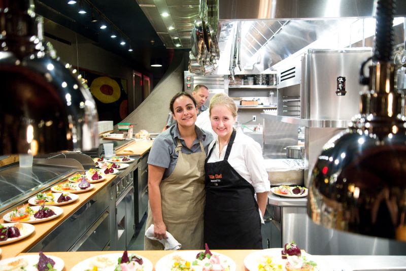 Big chef Amanee Neirouz with little chef Maggie McMillan