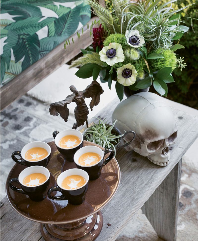 Tomato bisque with web-like crème fraîche.